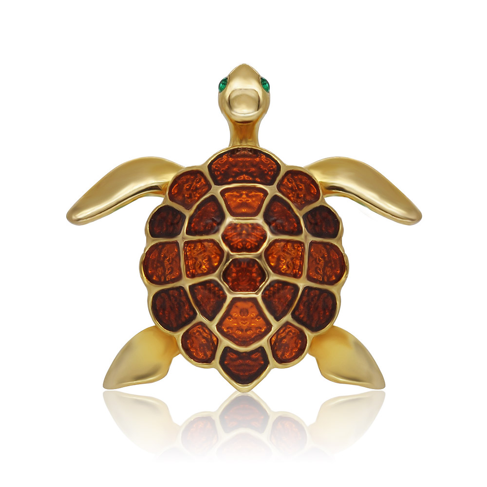 Side view of the gold-plated turtle enamel pin