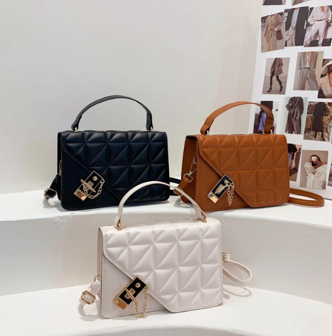 Our PU leather handbags are available in various colors like black, brown, and white.